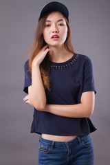 confident girl, happy woman; portrait of confident, positive, happy, successful asian woman in casual dress studio isolated; asian young adult woman model