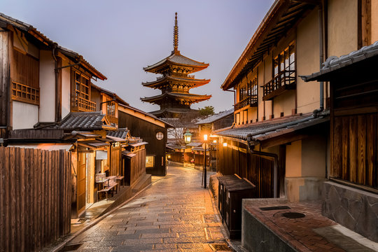 Japanese Pagoda And Old House In Snow Falling Day  At Kyoto Prefecture