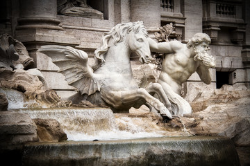 Detail of Trevi Fountain in Rome Italy with a vignette.