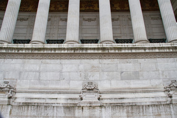 Naklejka premium A detail of an aged and weathered marble monument.