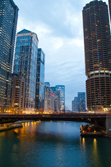 The Chicago River in the evening during the Blue Hour with plenty of city lights.