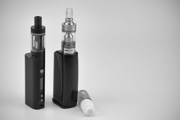 E - cigarette for vaping , technical devices.The liquid in the bottle   