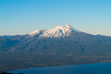 Mountain range landscape of the south of Chile, where you can see the Calbuco volcano and the Llanquihue lake below