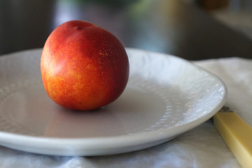 Nectarine on plate