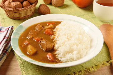 Chicken curry  with rice on a plate    