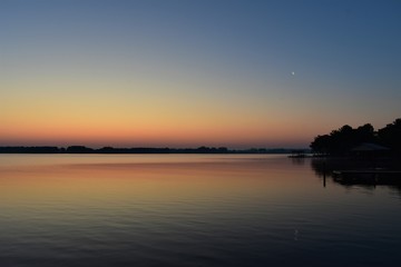 Fototapeta na wymiar Sunrise w/Crescent Moon