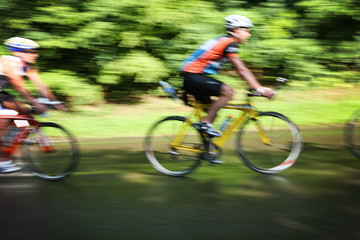 Fototapeta na wymiar Racing Cyclists, motion blurred