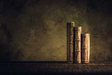 old books vintage on wood floor and paper aged background or texture