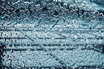 Raindrops on mirror (ideal for unique abstract wallpapers).