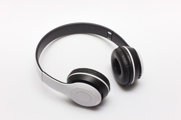White wireless headphones isolated on white background
