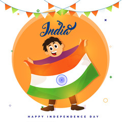 Cute boy holding Indian national flag, bunting flags. Independence Day celebration concept.