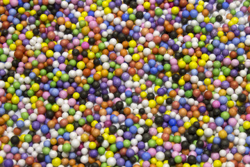 Fototapeta na wymiar Small Colorful Polysterene Balls background