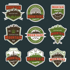 Mountain travel vector colored emblems or badges