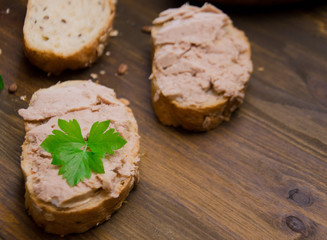 sandwiches with pate on wooden background selective focus