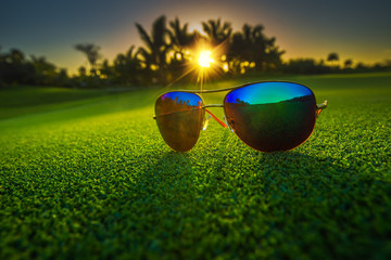 Beautiful sunglasses on golf course