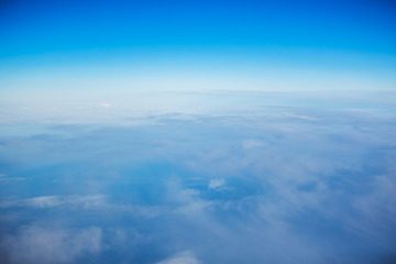 Flying above the clouds. view from the airplane