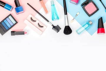 set of professional decorative cosmetics, makeup tools and accessory on white background with copy space for text. beauty, fashion, party and shopping concept. flat lay frame composition, top view