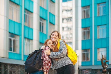 Fototapeta premium Happy girl hugging her friend.