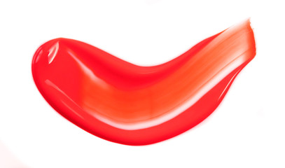 Liquid lipstick smudge isolated on white background