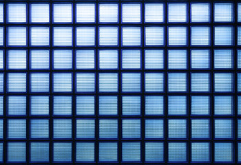 Glass block wall background,blue color toned