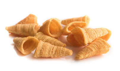 Crunchy corn snacks on a white background