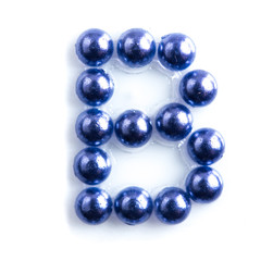 Blue beads font letter of english alphabet on white background