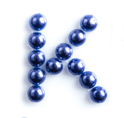 Blue beads font letter of english alphabet on white background