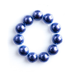 Blue beads font letter of english alphabet on white background