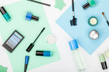 set of professional decorative cosmetics, makeup tools and accessory on white background. beauty, fashion, party and shopping concept. trendy flat lay composition, top view
