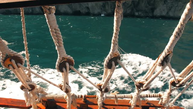 View through ship ropes at sea