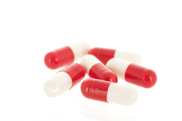 Red and white capsule pills