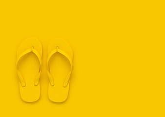 Flip flops on orange background with copy space