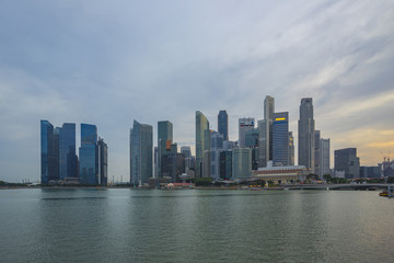 Sunset view of Singapore city skyline with Marina Bay