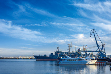 ships and yachts are at the pier, seaport