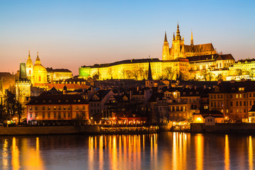 Naklejka na ściany i meble View of Charles Bridge, Prague Castle and Vltava river in Prague, Czech Republic during sunset time. World famous landmarks in Europe.
