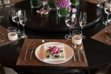Beautiful luxury dinner table setup using pink lotus of Thailand