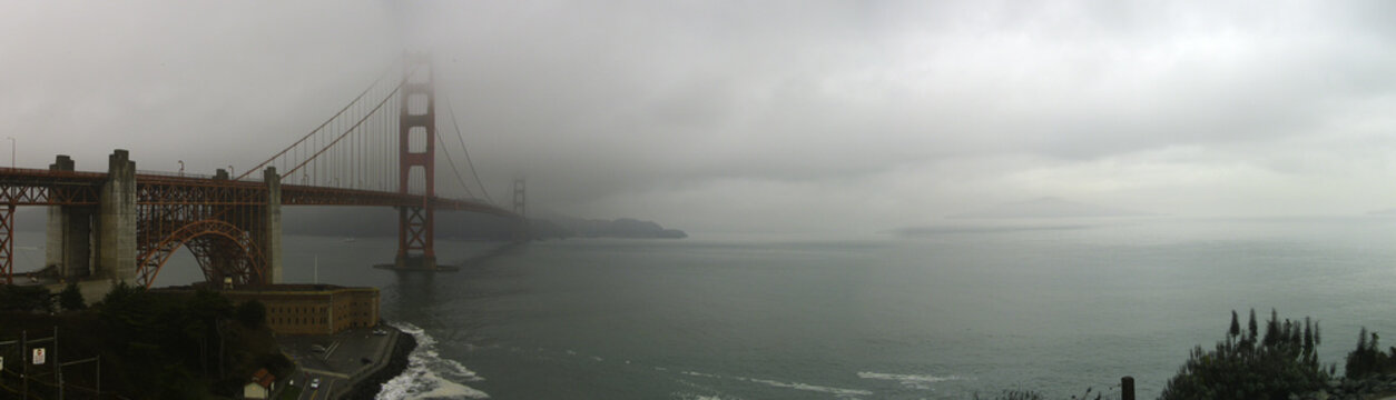the golden gate bridge in the fog panorama picture