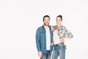 portrait of happy couple looking at camera isolated on white