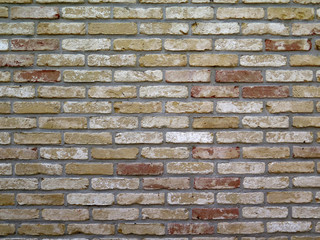 Rustic brick wall in Dutch fishing village