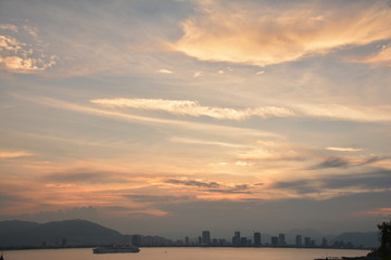Fototapeta premium sky, sunset, sunrise, clouds, clouds, red, crimson, moon, palm trees, lantern, city, height, reflection, reflection,