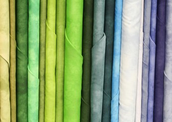 samples of colorful cotton fabric for sale in the tailor shop