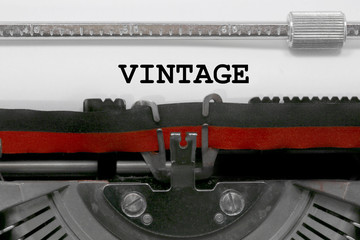 Vintage text by the old typewriter on white paper
