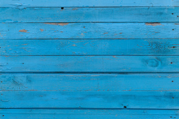 Fototapeta premium Horizontal background old painted blue board. Vintage texture