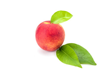 Peach with leaves isolated on white background