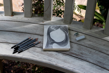 Fototapeta na wymiar drawing pencil portrait in the garden
