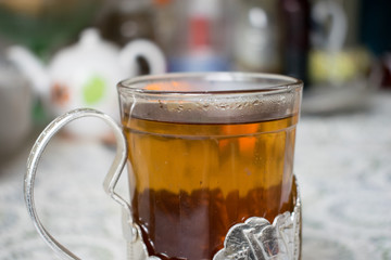 Tea in the Russian cup holder.