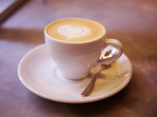 Fototapeta premium Cup of cappuccino with a pattern