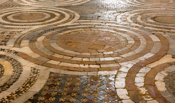 Interior of San Pietro Church - Tuscania (Viterno), Italy : details of the Cosmatesque Pavements with geometric decorativ inlay. Cosmati floor