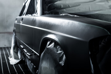 Auto body repair series: Black car after being repaint