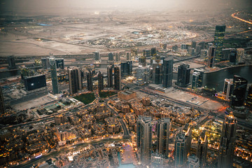 Dubai fountain aerial view in evening from Burj Khalifa wide angle 